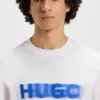 All-Gender-T-Shirt mit verwischtem Logo