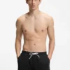 Badeshorts aus Mesh mit Jacquard-Logo-Band
