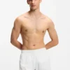 Badeshorts mit durchgehenden, übereinanderliegenden Logos