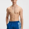Badeshorts mit vertikalem Logo-Print