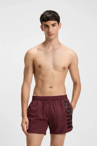Badeshorts mit vertikalem Logo-Print
