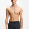Badeshorts mit wiederkehrenden Logos