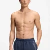 Badeshorts mit wiederkehrenden Logos