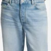 Blaue, konisch geschnittene Jeans aus Distressed-Denim Blaue, konisch geschnittene Jeans aus Distressed-Denim