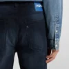 Blaue-schwarze Tapered-Fit-Jeans aus Stretch-Denim