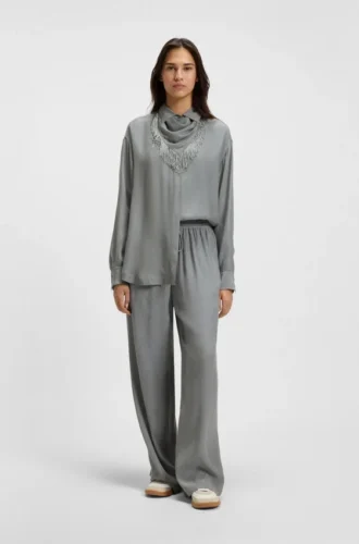 Bluse in Oversize-Passform mit Fransen und Logos