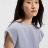Bluse in schmaler Passform mit drapiertem Ausschnitt