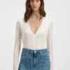 Bodysuit mit Stickmuster und V-Ausschnitt