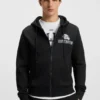 BOSS x DALLAS COWBOYS Kapuzenpullover mit Reißverschluss und alternativem Logo