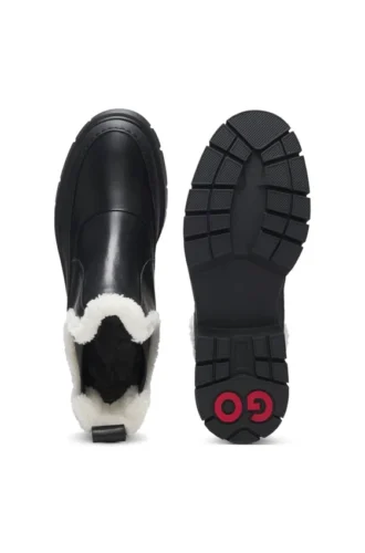 Chelsea-Stiefel aus Leder mit Kunstfellbesatz