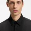 Funktionales, elastisches Slim-Fit-Hemd aus strukturiertem Jersey Funktionales, elastisches Slim-Fit-Hemd aus strukturiertem Jersey