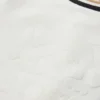 Geschenkset mit Strampler und Mütze für Babys
