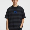 Gestreiftes Baumwoll-T-Shirt mit Happy HUGO-Logo
