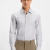 Gestreiftes Slim-Fit-Hemd aus Performance-Stretch-Material Gestreiftes Slim-Fit-Hemd aus Performance-Stretch-Material