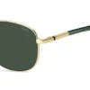 Goldfarbene Sonnenbrille mit grünen Akzenten