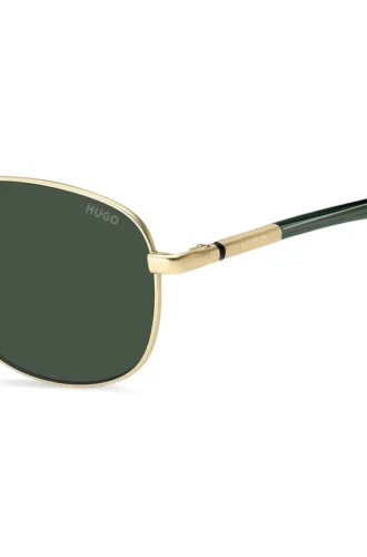 Goldfarbene Sonnenbrille mit grünen Akzenten