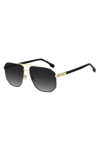 Goldfarbene Sonnenbrille mit schwarzen Akzenten