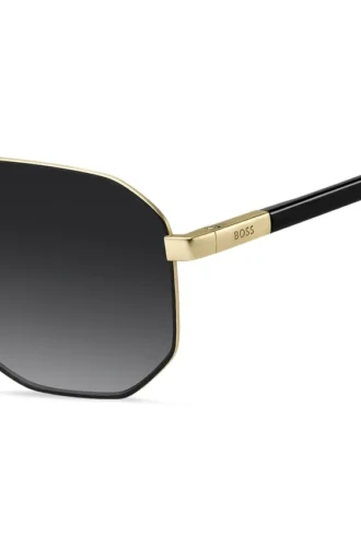 Goldfarbene Sonnenbrille mit schwarzen Akzenten