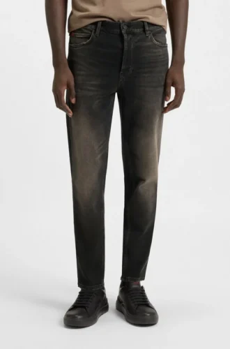 Graue, konisch geschnittene Jeans aus Stretch-Denim
