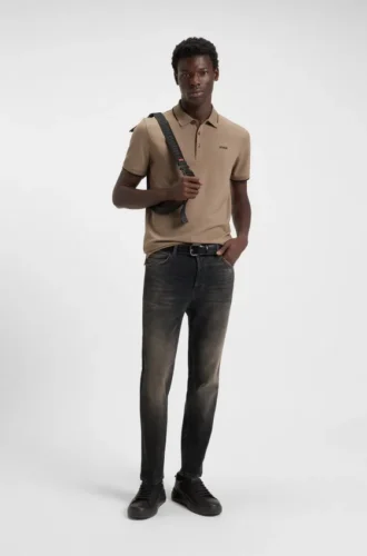 Graue, konisch geschnittene Jeans aus Stretch-Denim