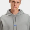 Hoodie aus Baumwoll-Frottee mit blauem Logo-Label