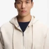 Hoodie aus Baumwollfrottee mit Reißverschluss und charakteristischen Streifenbesätzen