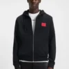 Hoodie aus Baumwollfrottee mit Reißverschluss und Logo-Etikett Hoodie aus Baumwollfrottee mit Reißverschluss und Logo-Etikett