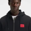 Hoodie aus Baumwollfrottee mit Reißverschluss und Logo-Etikett Hoodie aus Baumwollfrottee mit Reißverschluss und Logo-Etikett