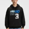 Hoodie mit gemischten Motiven aus Baumwollfrottee