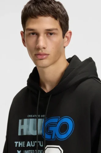 Hoodie mit gemischten Motiven aus Baumwollfrottee