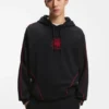 HUGO x RB Hoodie aus Stretch-Baumwolle mit Stiermotiv HUGO x RB Hoodie aus Stretch-Baumwolle mit Stiermotiv