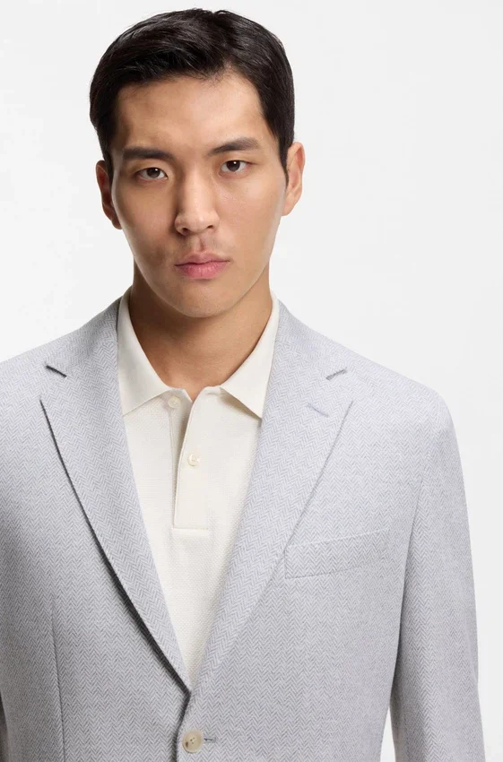 Jacke in Regular-Fit mit Fischgrätenmuster aus einer Baumwollmischung Jacke in Regular-Fit mit Fischgrätenmuster aus einer Baumwollmischung