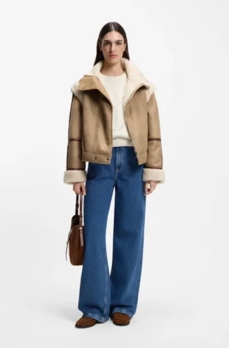 Jacke mit abnehmbaren Ärmeln aus Kunstlammfell