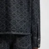 Jacke mit geometrischem Print aus festem Denim Jacke mit geometrischem Print aus festem Denim