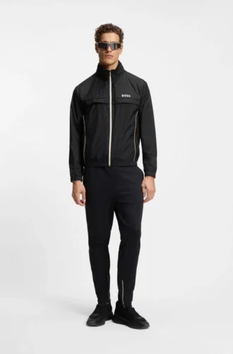 Jacke mit Kontrastpaspeln und wasserabweisender Beschichtung