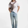 Jeans in lockerer, konisch zulaufender Passform aus hellblauem Denim Jeans in lockerer, konisch zulaufender Passform aus hellblauem Denim