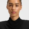 Jerseykleid mit gefiederten Plisseefalten