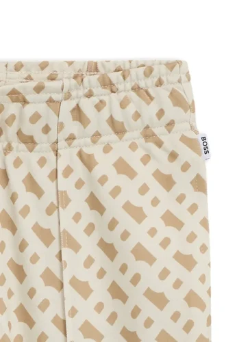 Jungen-Jogginghose mit Reißverschluss am Saum und Monogramm-Print