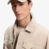 Kappe aus Wildleder mit Metall-Logo-Niete