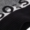 Kinder-Beanie mit Bommel und Jacquard-Logo Kinder-Beanie mit Bommel und Jacquard-Logo