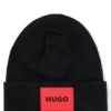 Kinder-Beanie mit rotem Logo-Etikett aus Gummi Kinder-Beanie mit rotem Logo-Etikett aus Gummi