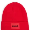 Kinder-Beanie mit rotem Logo-Etikett aus Gummi Kinder-Beanie mit rotem Logo-Etikett aus Gummi