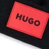 Kinder-Beanie mit rotem Logo-Etikett aus Gummi Kinder-Beanie mit rotem Logo-Etikett aus Gummi