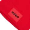 Kinder-Beanie mit rotem Logo-Etikett aus Gummi Kinder-Beanie mit rotem Logo-Etikett aus Gummi