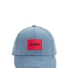 Kinder-Cap mit Logo-Applikation aus Baumwoll-Denim Kinder-Cap mit Logo-Applikation aus Baumwoll-Denim