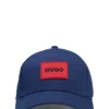 Kinder-Cap mit Logo-Aufnäher aus Baumwolltwill Kinder-Cap mit Logo-Aufnäher aus Baumwolltwill