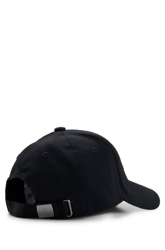 Kinder-Caps aus Baumwolltwill mit rotem Logo-Etikett aus Gummi Kinder-Caps aus Baumwolltwill mit rotem Logo-Etikett aus Gummi