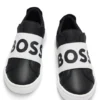 Kinder-Sneaker mit Logo-Riemen aus Canvas und Leder Kinder-Sneaker mit Logo-Riemen aus Canvas und Leder