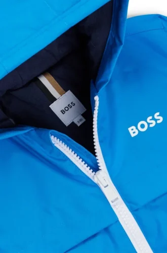 Kinder-Windjacke im Color-Blocking-Design mit sichtbar werdendem Monogramm-Print