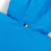 Kinder-Windjacke im Color-Blocking-Design mit sichtbar werdendem Monogramm-Print
